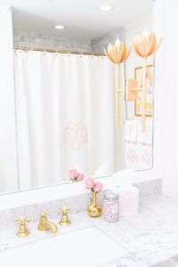 Caroline of House of Harper shares her daughter's bathroom complete with monogram towels and darling details!